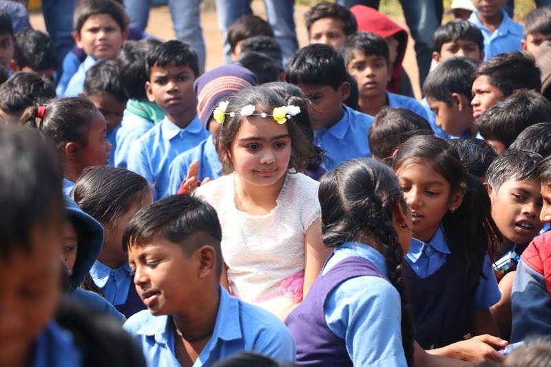 Students smiling during the birthday celebration covered by Bhilai Times at a government school in Bhilai.
